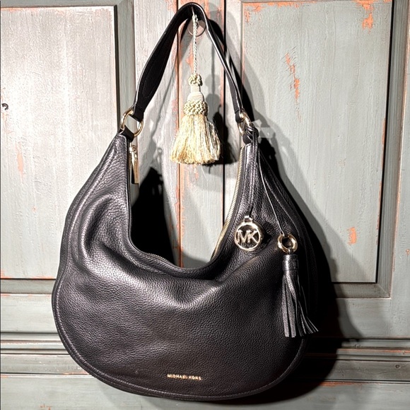 Michael Kors Handbags - NWOT Michael Kors Black Leather Hobo Bag